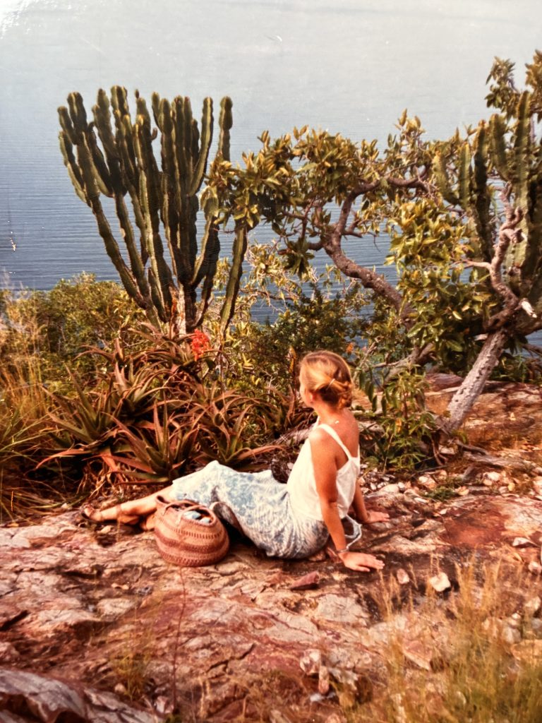 Young traveller looking over Lake Victoria in Kenya at the start of her independent travel journey in 1982