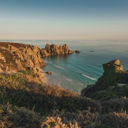 UK coastal staycation with cars and holiday accommodation in summer